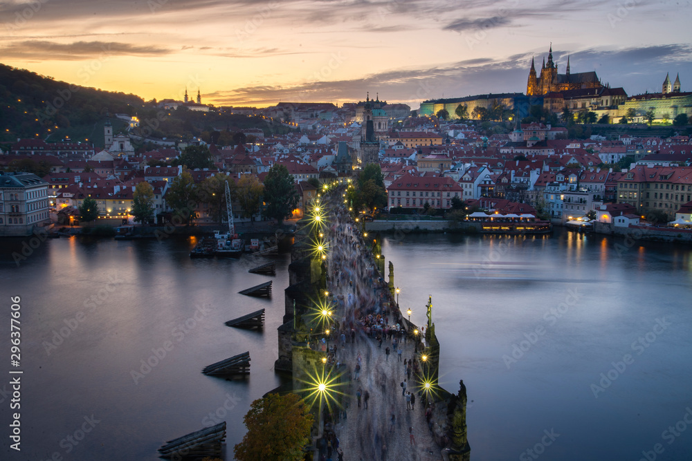 Panorama of Prague with red roofs from above autumn day at dusk, Czech Republic