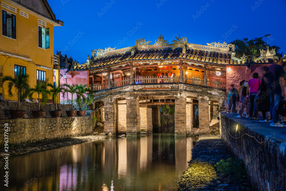 Japanese Covered ancient Bridge and River in Street in Old city of Hoi An in Southeast Asia in Vietnam. Vietnamese heritage and culture in Hoian at night