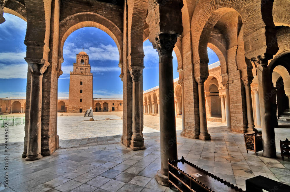 The Great Mosque of Kairouan also known as the Mosque of Uqba situated in the town of Kairouan, Tunisia.  - obrazy, fototapety, plakaty 