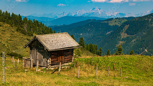 Beautiful alpine view with a wooden hut at Zauchensee, Salzburg, Austria
