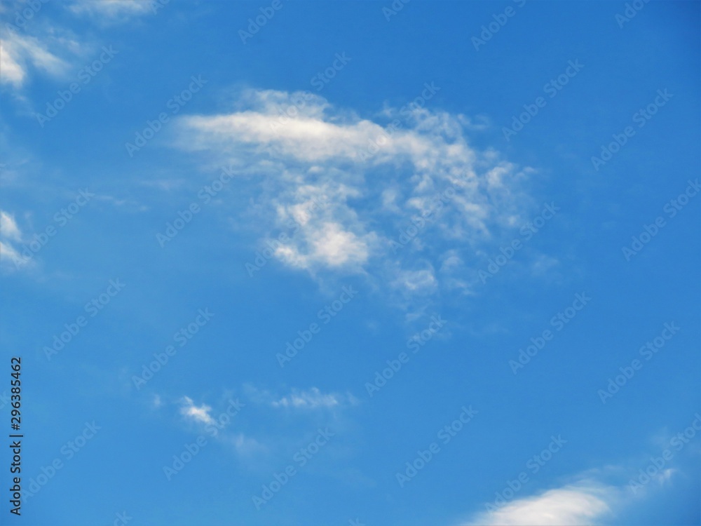 white clouds in the blue sky