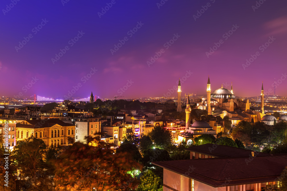 Hagia Sophia and the bridge over the night Bosphorus. Istanbul, Turkey