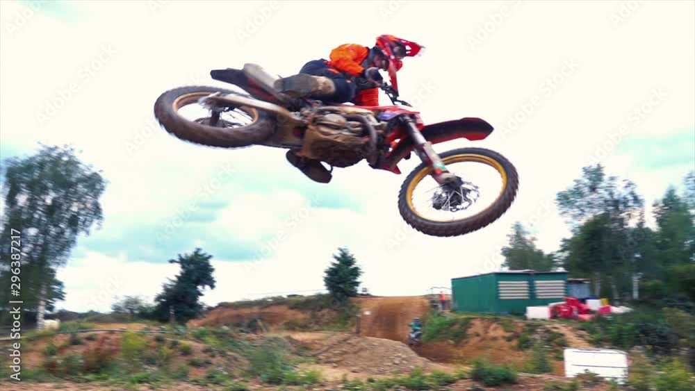 Extreme Motocross MX Rider riding on dirt track Extreme Motocross MX Rider riding on dirt track