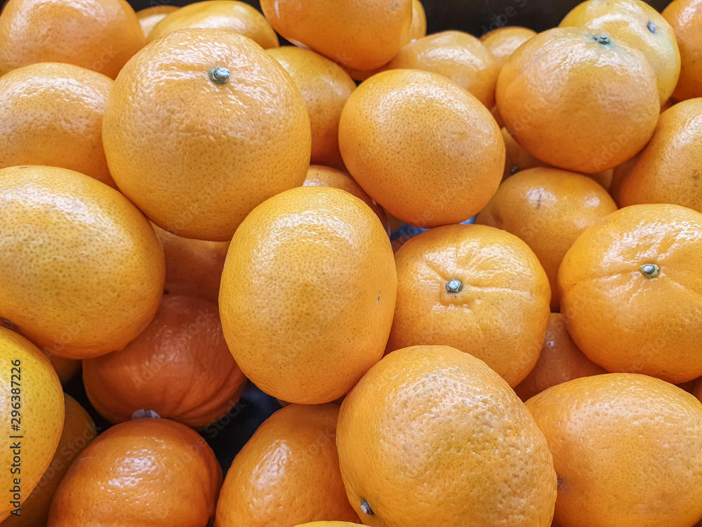 Closeup of oranges on a market