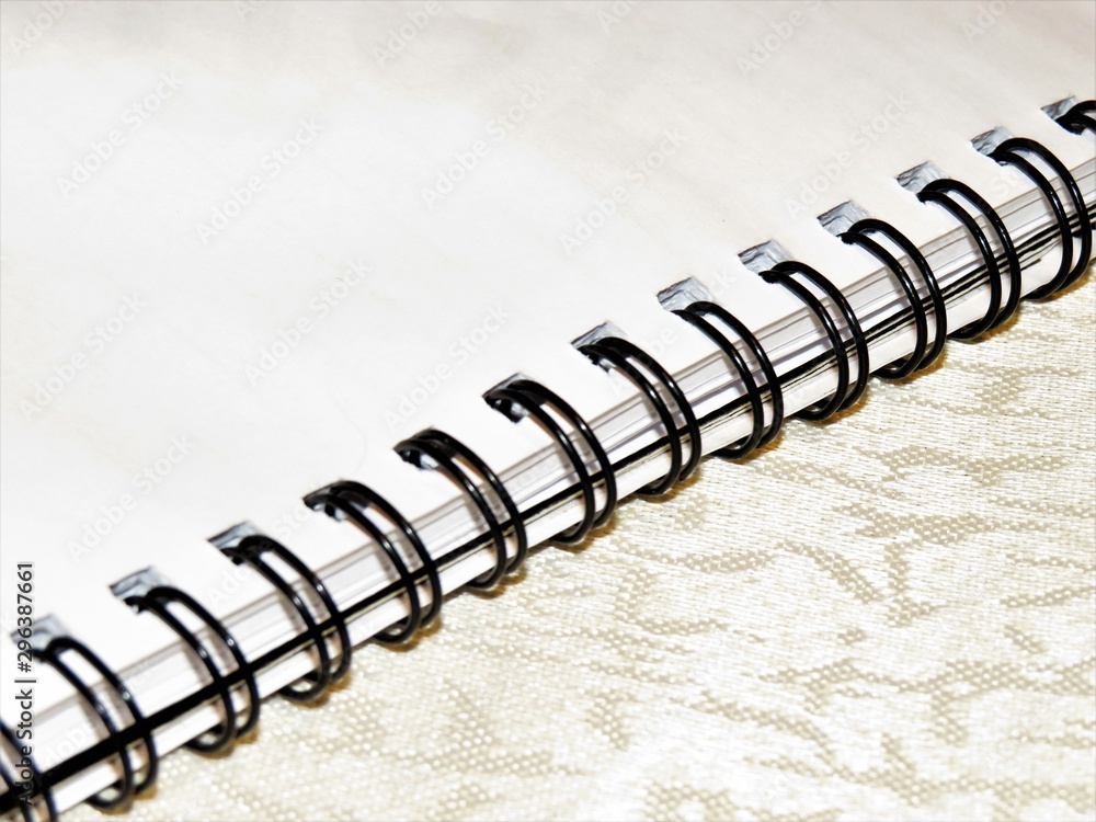 notebook with metallic spiral