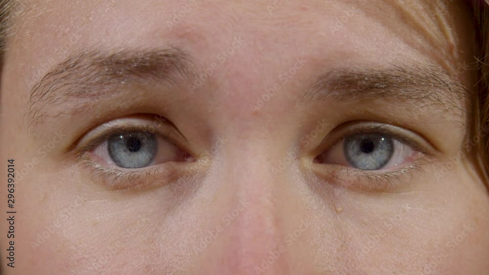 Woman Awakening Eyes Details. Studio Isolated Shot Against Green Screen Background Woman Awakening Eyes Details. Studio Isolated Shot Against Green Screen Background