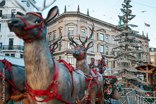 Reindeers with Santa claus at the Christmas market in central Copenhagen, Denmark