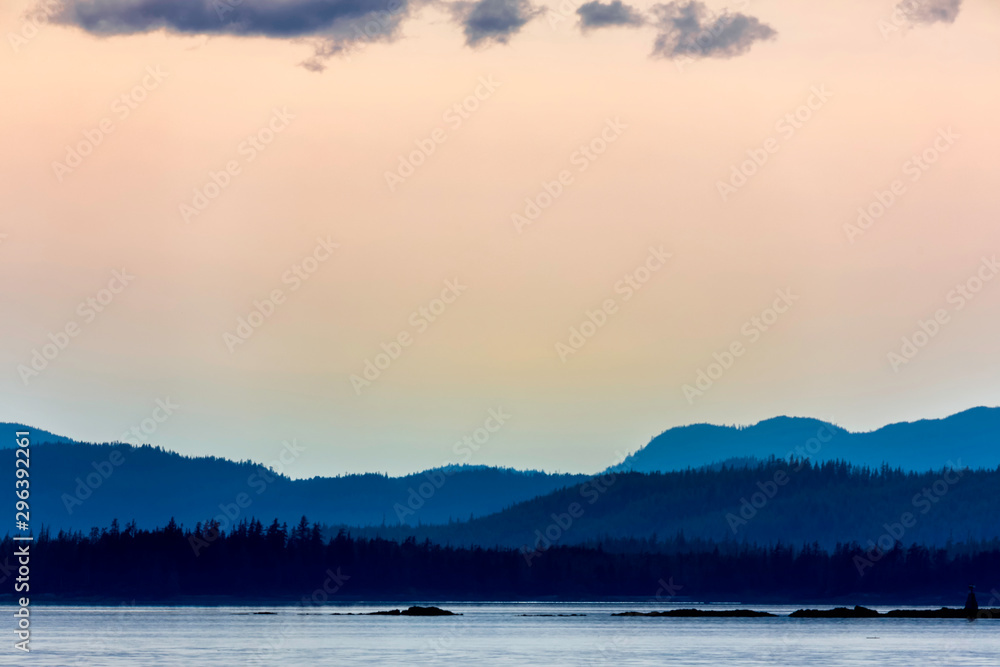 Pink Sunset over archipelago and Mountains