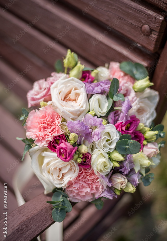 beautiful wedding bouquet on the bench