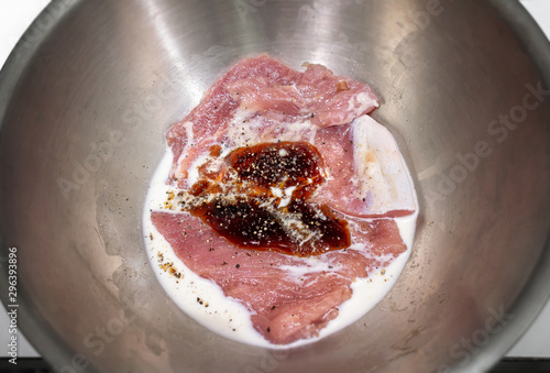 Marinating Raw Meat in a Stainless Steel Mixer