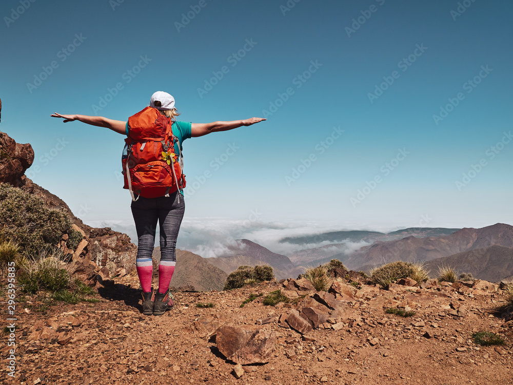 Blonde tourist backpacker girl looking to the distance in Morocco Blonde tourist backpacker girl looking to the distance in Morocco