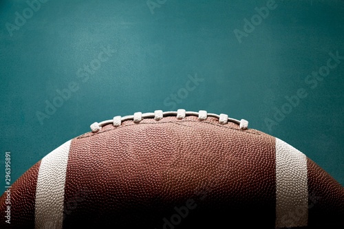American football ball on background