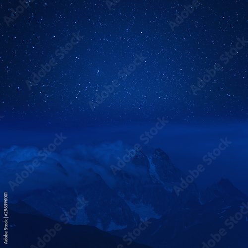 Night mountains and stars in sky