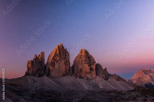 Tre Cime di Lavaredo in beautiful light at sunrise in the Sexten Dolomites, South Tyrol, Italy