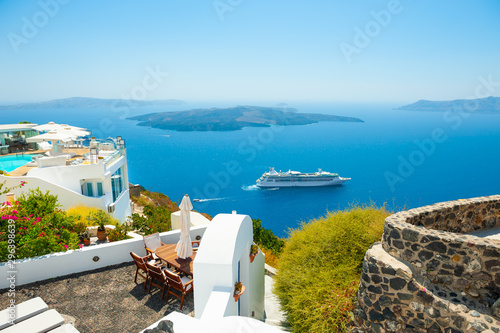 White architecture and blue sea on Santorini island, Greece. Summer holidays, travel destinations concept