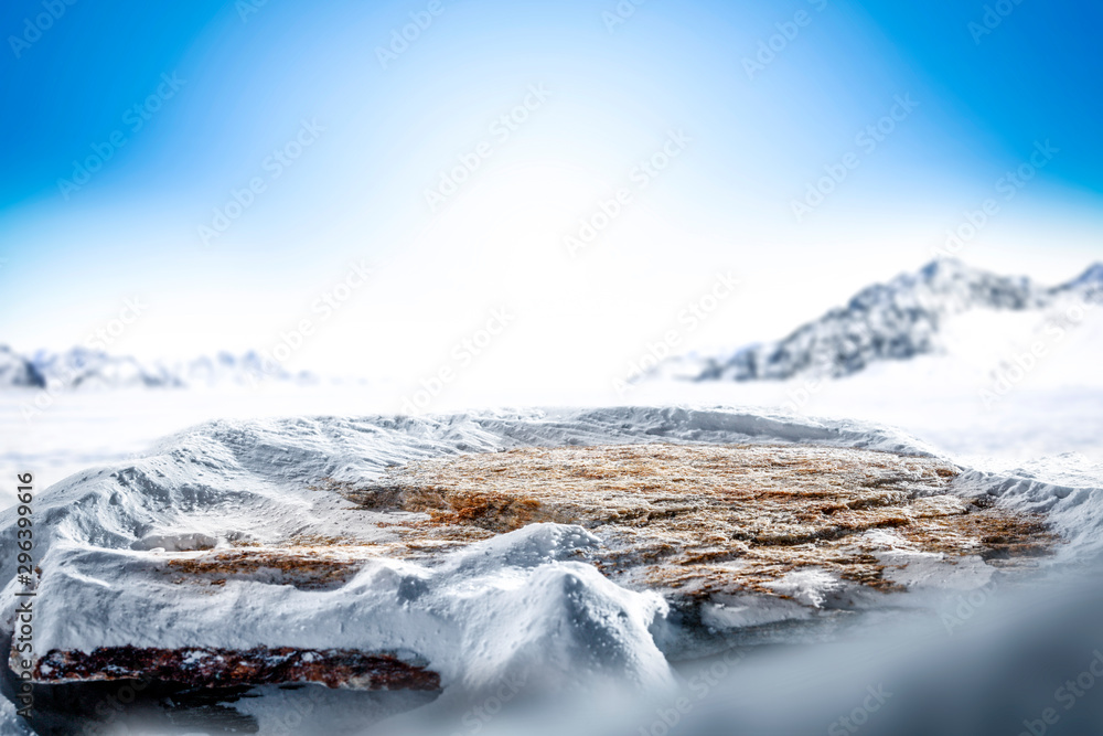 Table background of free space and winter landscape with snowflakes. 
