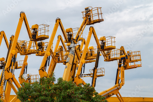 Wallpaper Mural Lot of aerial work platforms. Articulating boom lifts Torontodigital.ca
