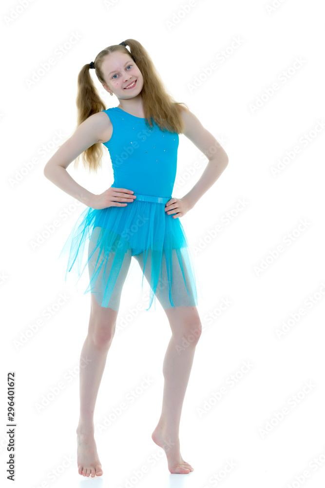 The gymnast prepares to perform the exercise. The gymnast prepares to perform the exercise.
