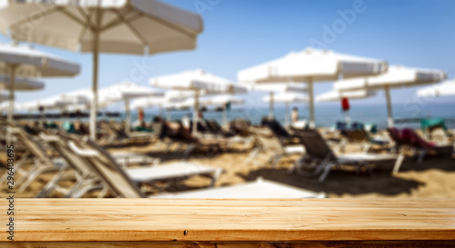 Desk of free space and summer beach 