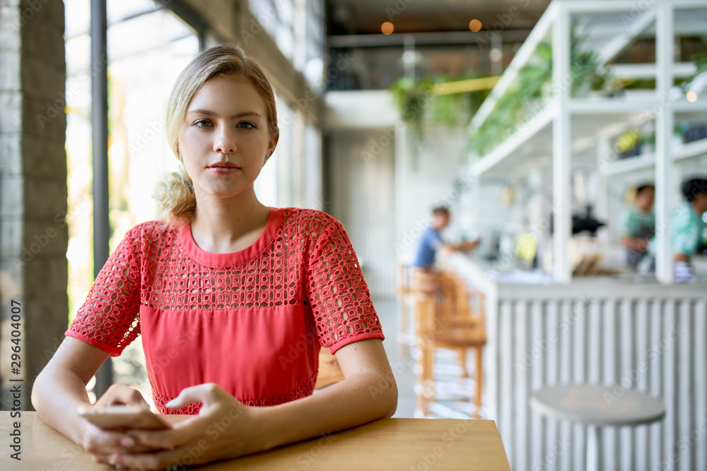 Lifestyle portrait of confident young female professional blonde Lifestyle portrait of confident young female professional blonde