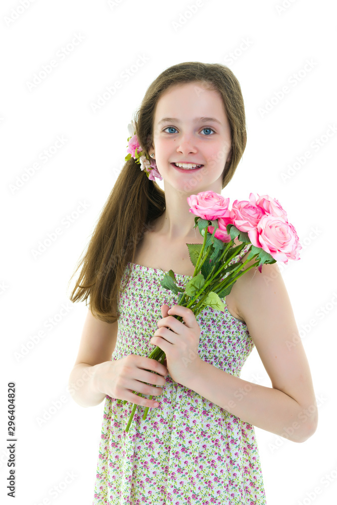 Little girl with a bouquet of flowers.Concept of holiday, summer Little girl with a bouquet of flowers.Concept of holiday, summer