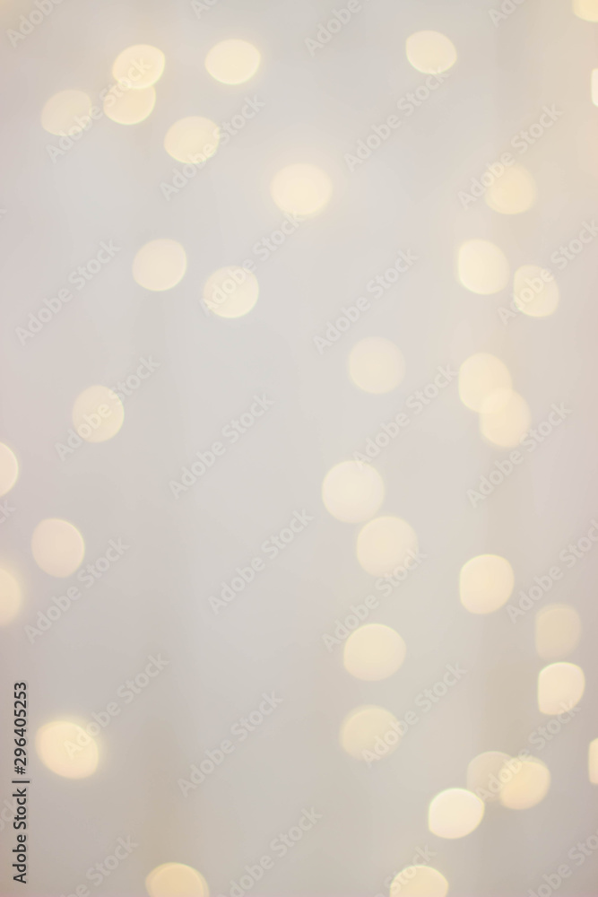 Wooden background with yellow bokeh bulbs. - obrazy, fototapety, plakaty 