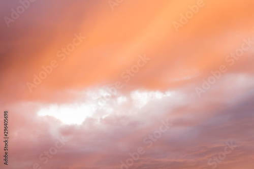 The blur pastels gradient sunset background on soft nature sunrise peaceful morning beach outdoor. heavenly mind view at a resort deck touching sunshine, sky summer clouds. © Green Juli