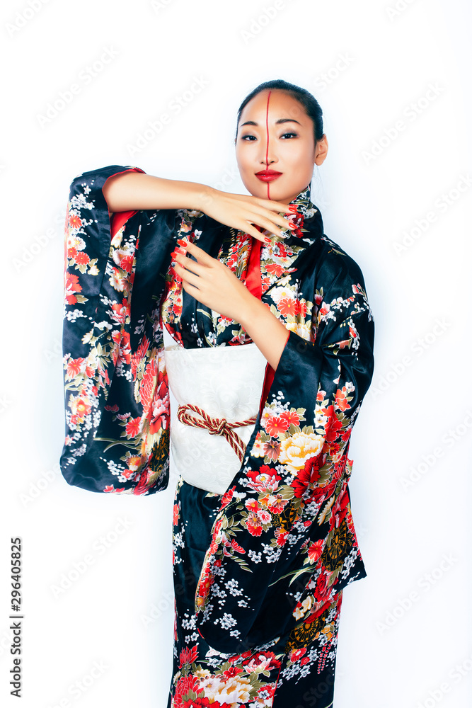 young pretty real geisha in kimono with sakura and decoration on white background isolated young pretty real geisha in kimono with sakura and decoration on white background isolated