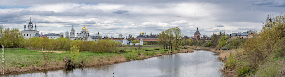 Panoramic view of Kamenka river and two monasteries in Suzdal. Well preserved old Russian town-museum. A member of the Golden ring of Russia Panoramic view of Kamenka river and two monasteries in Suzdal. Well preserved old Russian town-museum. A member of the Golden ring of Russia