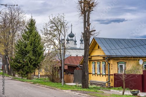 Street with old wooden houses in Suzdal, a well preserved old Russian town-museum. A member of the Golden ring of Russia