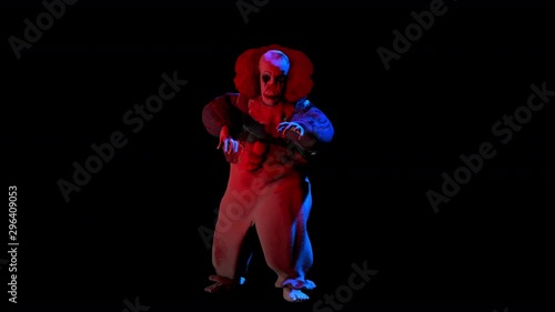 Creepy seamless animation of an horror zombie clown . Halloween background of a terror character isolated with alpha channel photo