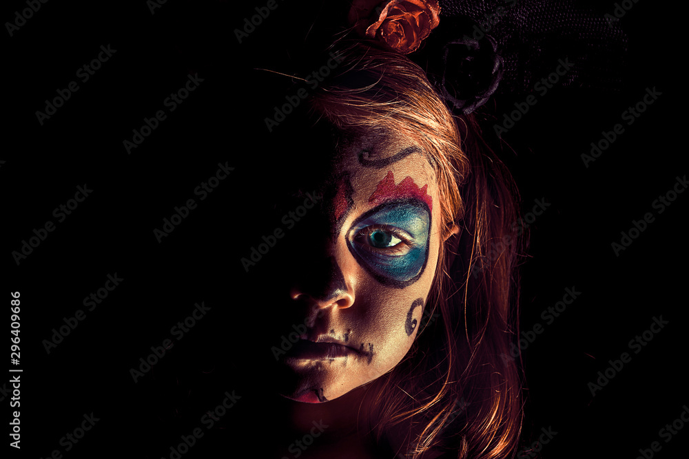 Spooky portrait of a girl. halloween party and the day of the dead concept Spooky portrait of a girl. halloween party and the day of the dead concept