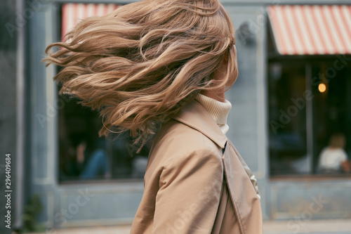 Portrait of attractive girl dreamily whirling outdoor