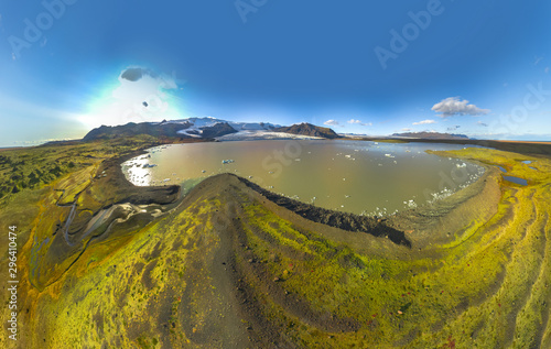 Icelandic aerial landscape. Panorama of the Fjallsarlon glacier and the lagoon at sunset.