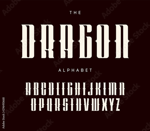 Tall and bold letters set with serifs and cutouts. Tattoo style alphabet. Vector font for alcohol, tattoo, music, art, monogram, posters, gothic lettering and calligraphy. Typographic design.