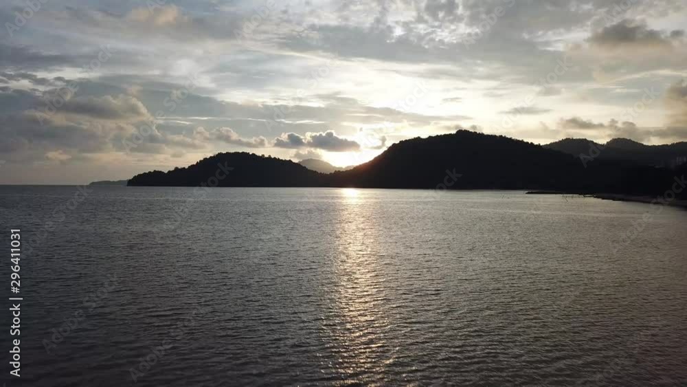 Low angle move at sea with background mountain. Low angle move at sea with background mountain.