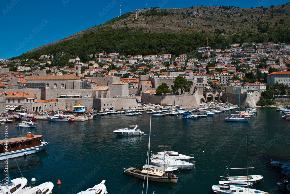 Dubrovnik, Croatia: View of the Old Port. Dubrovnik is a Croatian city on the Adriatic Sea. It is one of the most prominent tourist destinations in the Mediterranean Sea