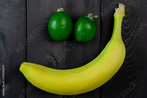 Fruit emoticon. Banana and Feijoa
