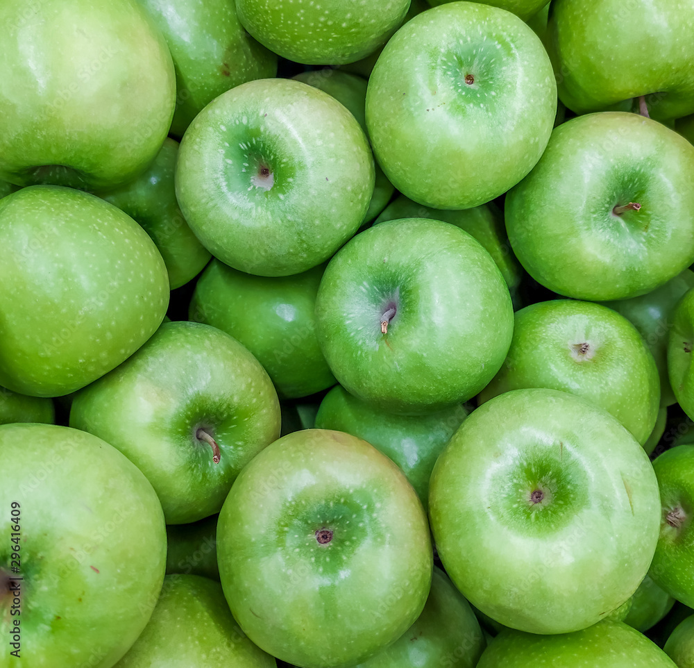 Background green apples. Fruit background. Apples on the apples. Background green apples. Fruit background. Apples on the apples.