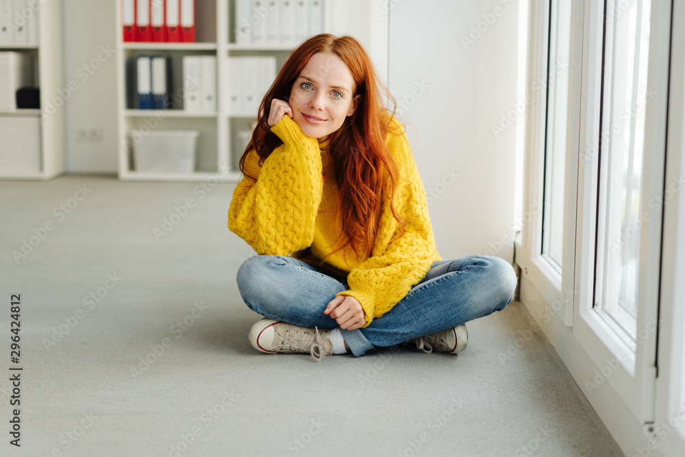 Thoughtful casual young woman in jeans and sweater Thoughtful casual young woman in jeans and sweater