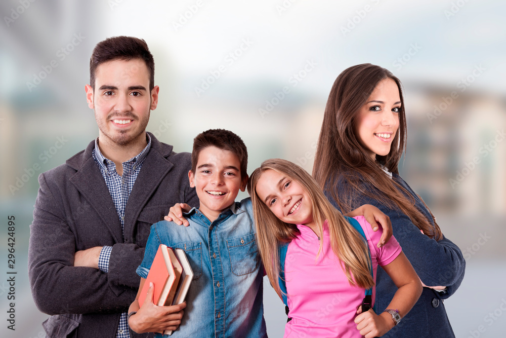 happy young family with children couple with books outdoors happy young family with children couple with books outdoors