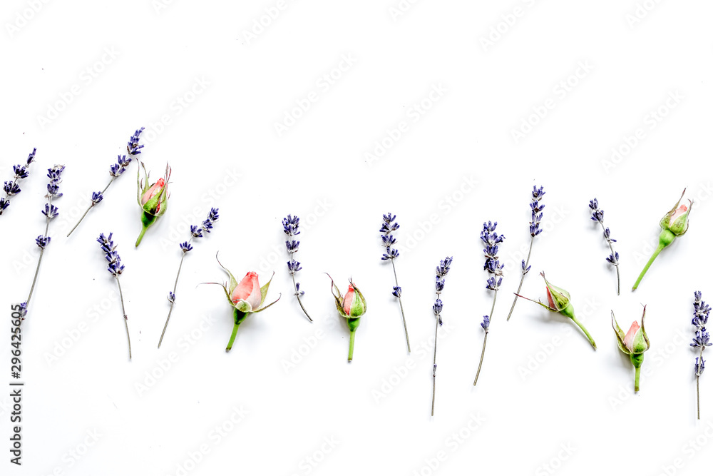 Fototapeta premium pattern of flowers on white background top view mock up