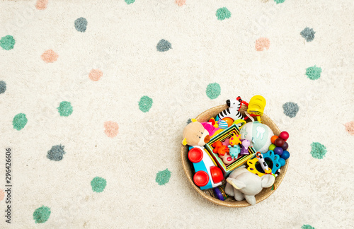 Top view on Colorful Baby Toys on a Carpet Background Toys in the floor with Copy Space for Text