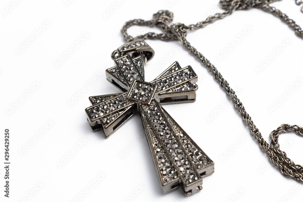 Big cross with rhinestones on a white background isolate Big cross with rhinestones on a white background isolate