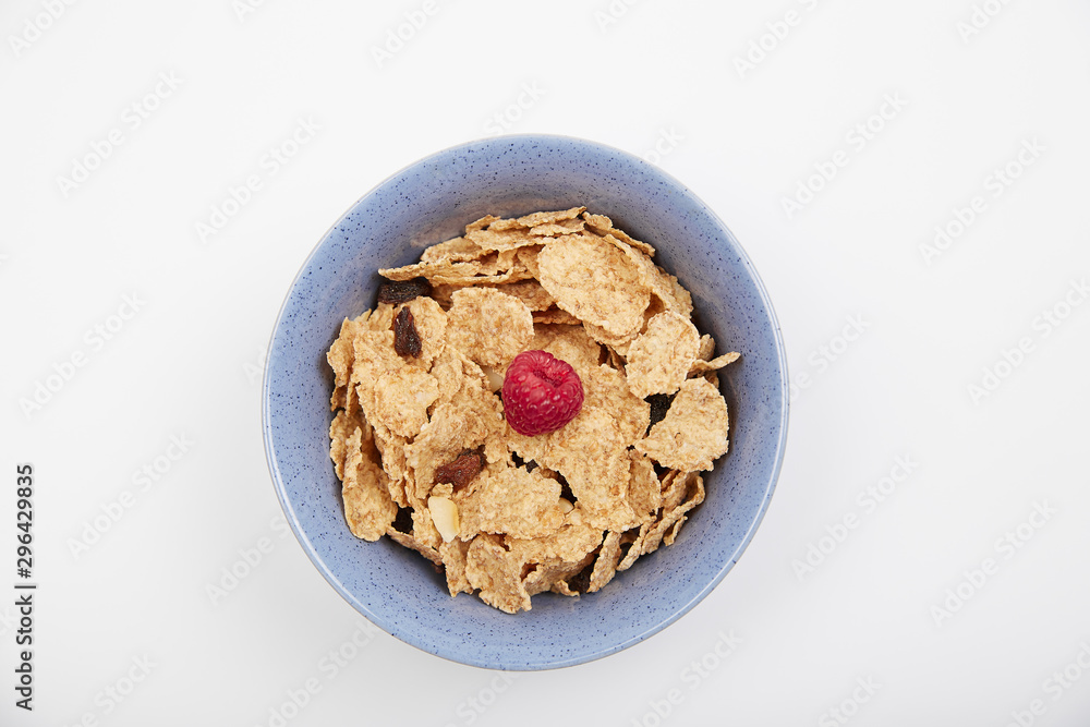 Dry cereal breakfast cereal with berries and nuts in a bowl