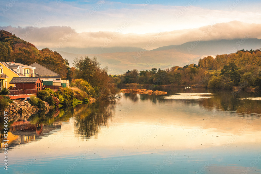 Fototapeta premium Spectacular view landscape mountain hill foggy day sunrise Killorglin Kerry Ireland red green forest