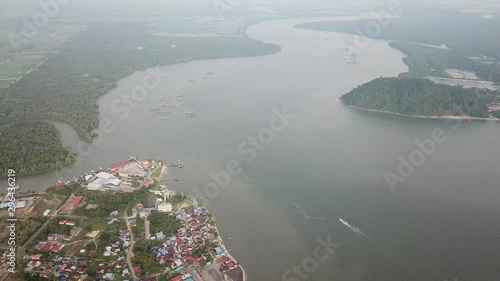 Aerial bot move near Tanjung Dawai fishing village. photo