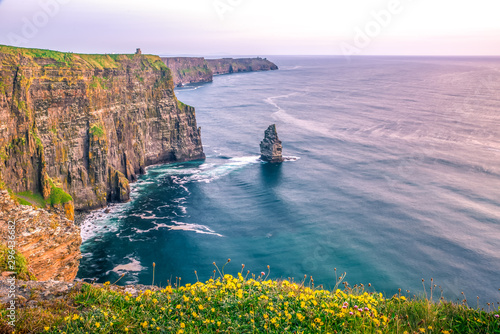 Obraz na płótnie Cliffs of Moher Ireland sunset sun light Irish landmark amazing beautiful view