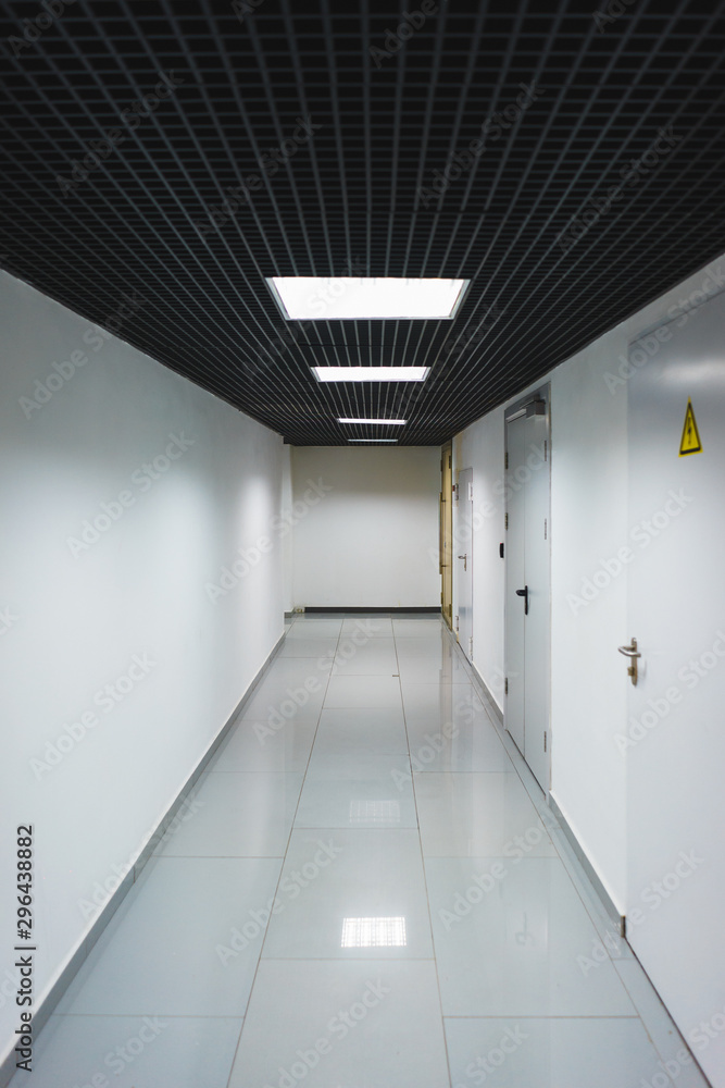 Interior internal corridor of modern office, industrial premises, laboratories or institutions.