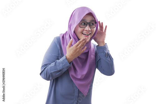 Muslim Woman Smiling While Doing Hearing Gesture